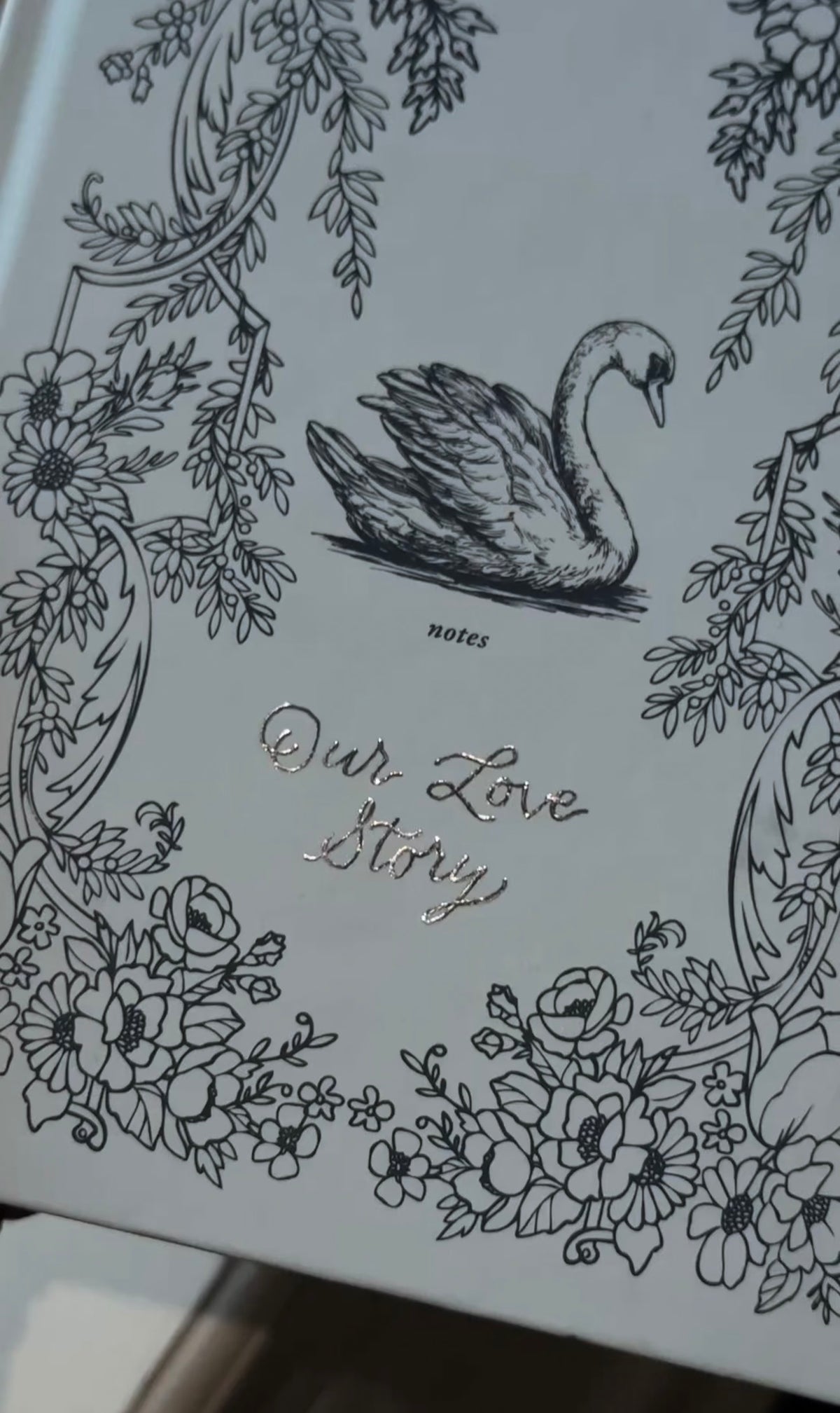 Light blue leather journal with swan and floral cover detail — hot foiled personalization at La Villa KC