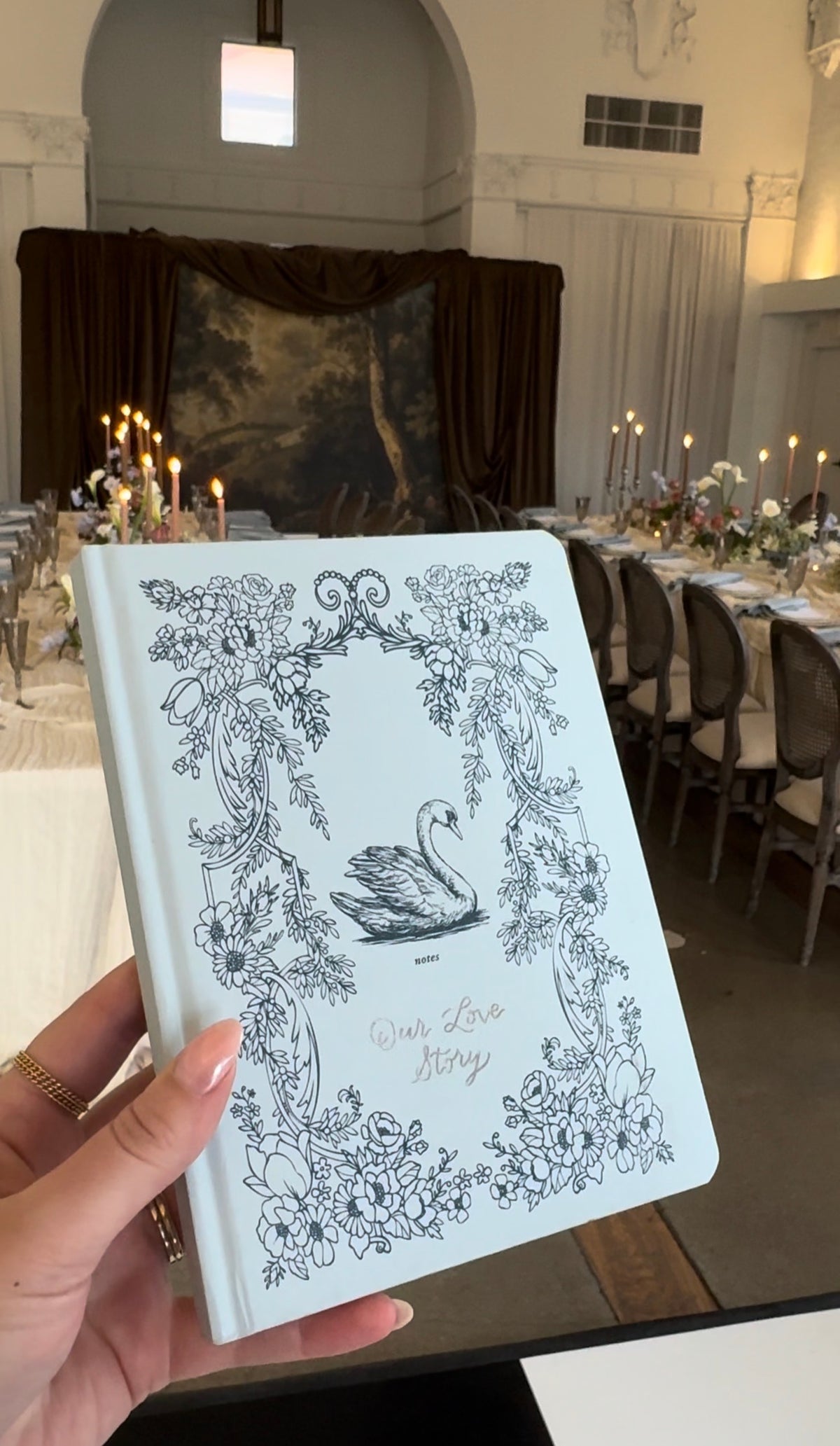 Light blue leather journal with swan and floral cover detail — hot foiled personalization at La Villa KC