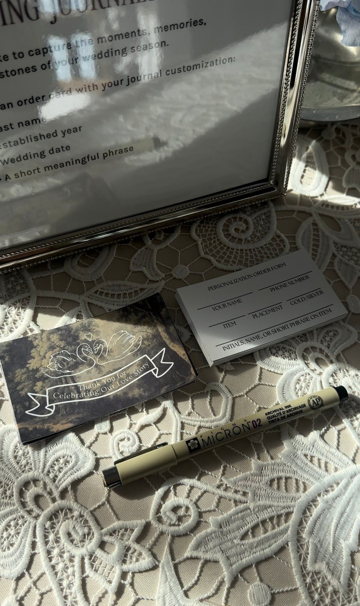 Whimsical romantic wedding reception styling at La Villa KC Kansas City — swans and lace