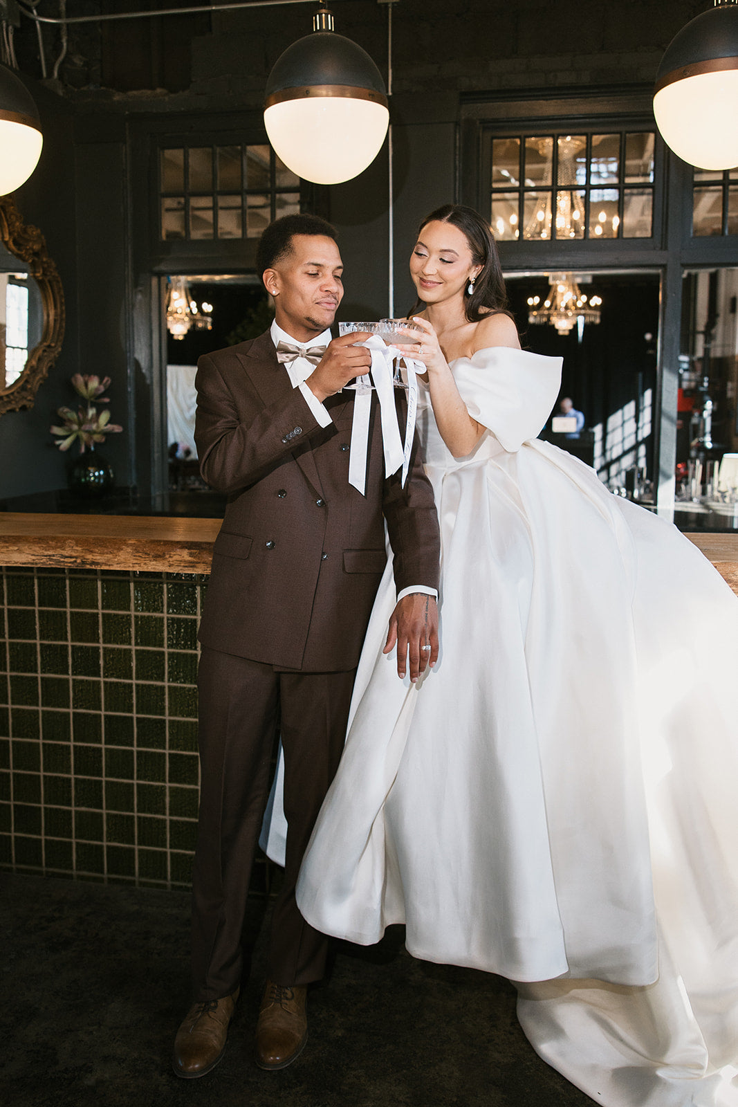 Bride and groom at The Firehouse KC Kansas City blush and chocolate wedding inspiration editorial