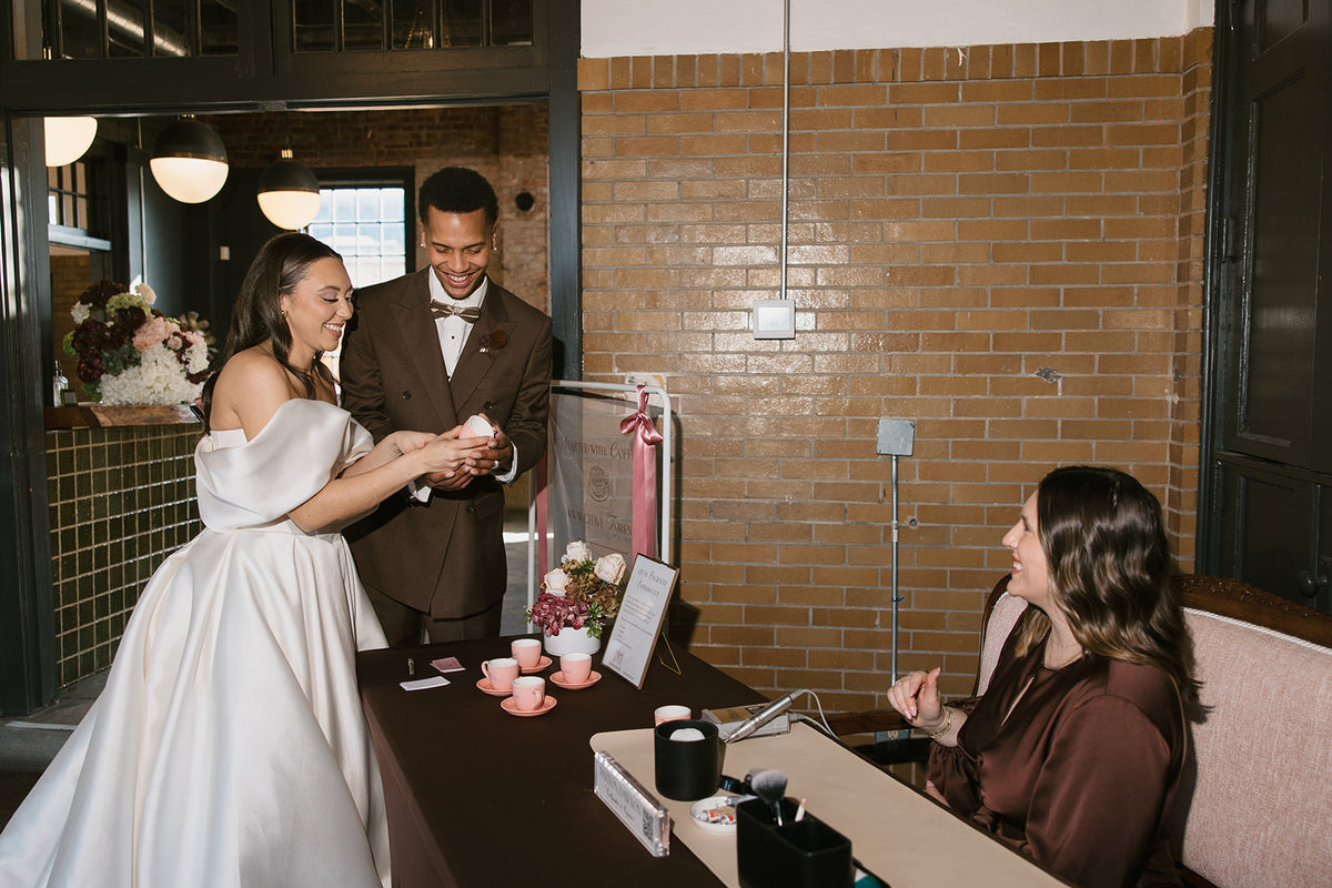  Paxton Dawson engraving a pink espresso cup live at The Firehouse KC wedding inspiration shoot