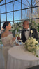 Bride and Groom receiving a personalized engraved champagne glass at Kansas City wedding cocktail hour